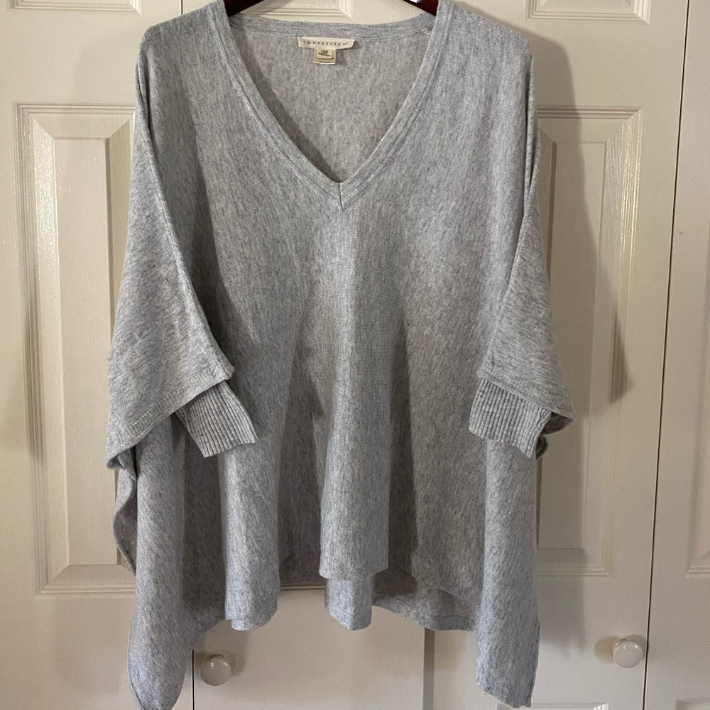 V-neck poncho sweater with sleeves b
